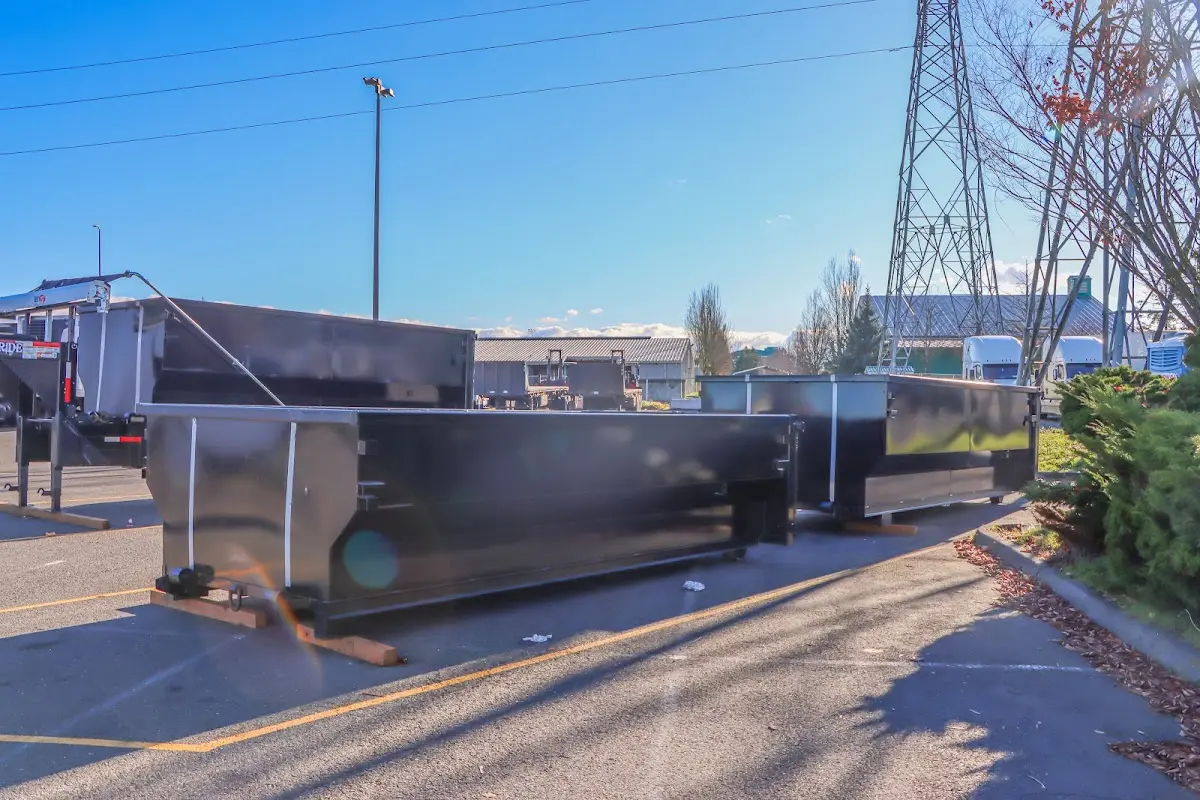 Roll-off dumpster ready for waste disposal at job site for 2 Yard Dumpster Rental in Chubbuck